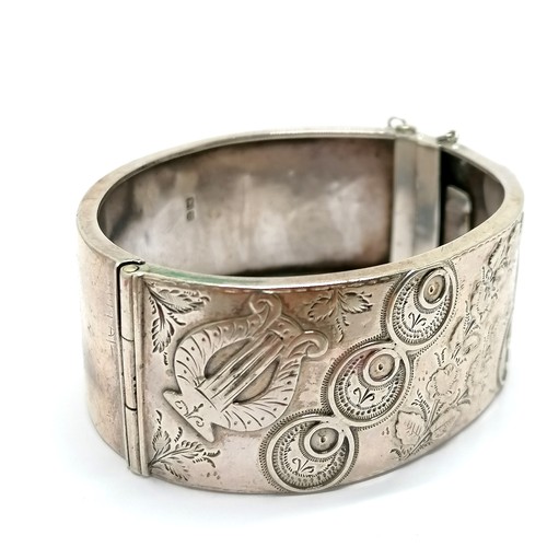 510 - Antique Victorian silver hallmarked bangle with unusual design inc lyre by Constantine & Floyd - 6cm... 