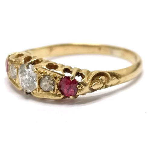 528 - Antique gold (touch tests as 18ct) ruby / diamond 5 stone ring - size N & 2.3g total weight ~ centre... 