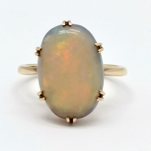 533 - 9ct marked gold opal stone set ring - size L & 2.9g total weight ~ has wear to stone