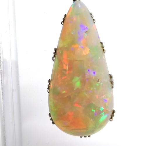 541 - Antique large opal pendant set in unmarked 18ct gold with diamond set bale (4cm drop & 6.4g total we... 