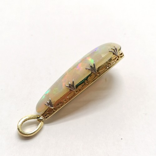 541 - Antique large opal pendant set in unmarked 18ct gold with diamond set bale (4cm drop & 6.4g total we... 