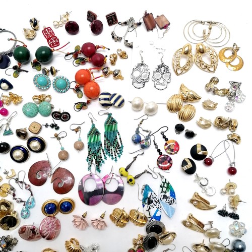 604 - Large qty of costume earrings inc skull, axeheads, gold tone etc - SOLD ON BEHALF OF THE NEW BREAST ... 