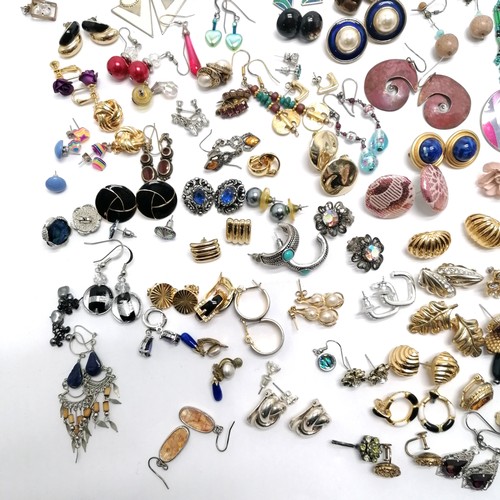 604 - Large qty of costume earrings inc skull, axeheads, gold tone etc - SOLD ON BEHALF OF THE NEW BREAST ... 