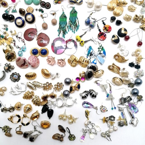 604 - Large qty of costume earrings inc skull, axeheads, gold tone etc - SOLD ON BEHALF OF THE NEW BREAST ... 