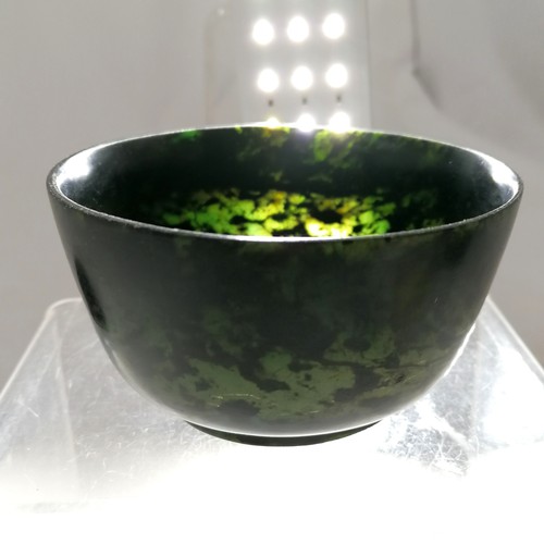 23 - Oriental hardstone spinach jade bowl on hand carved wooden stand - bowl 10.5cm diameter x 5.5cm high... 