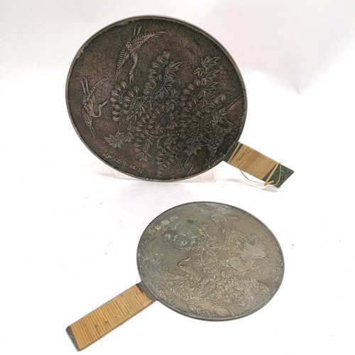 27 - 2 x antique Oriental bronze hand mirrors with tree & bird detail - largest 22.5cm diameter ~ both ra... 