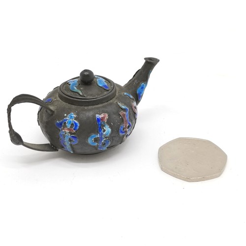 34 - Antique Chinese miniature silver teapot with enamel detail 3.5cm high x 7.5cm across - has some dete... 