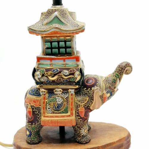 42 - Vintage Japanese satsuma elephant figural lampbase with pagoda detail and has wooden base - 32cm hig... 