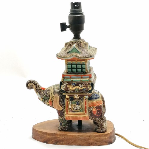 42 - Vintage Japanese satsuma elephant figural lampbase with pagoda detail and has wooden base - 32cm hig... 