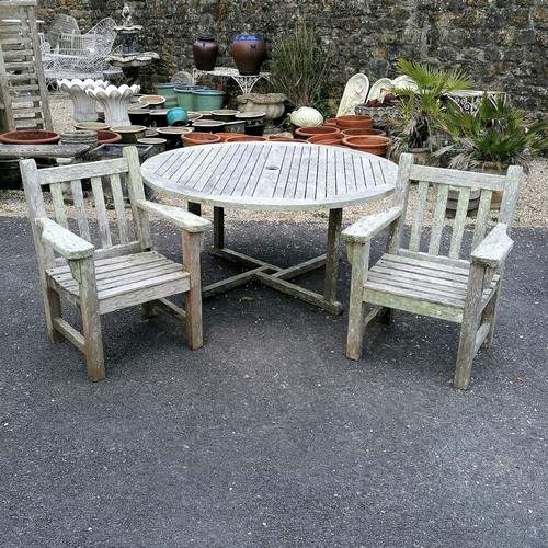 50 - Circular Barlow Tyrie weathered teak garden table and 2 chairs - 1 chair has slight damage - 149cm d... 