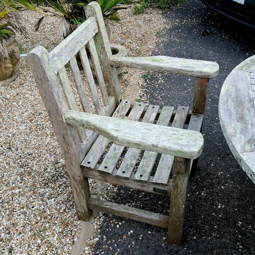 50 - Circular Barlow Tyrie weathered teak garden table and 2 chairs - 1 chair has slight damage - 149cm d... 