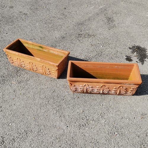 53 - Pair of rectangular terracotta planters with raised leaf motifs - 63cm long - some losses