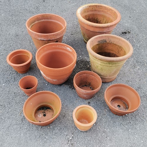 82 - 4 large terracotta planters t/w 6 terracotta plant pots - largest 48cm diameter x 34.5cm high - some... 