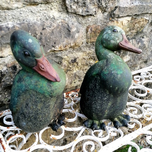 83 - Pair of duck garden ornaments - 31cm high - 1 has a broken foot