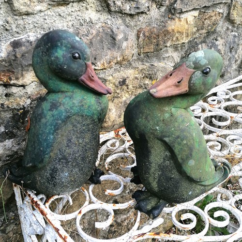 83 - Pair of duck garden ornaments - 31cm high - 1 has a broken foot