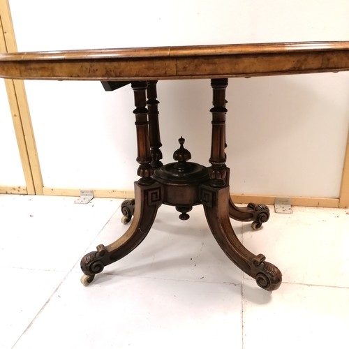 89 - Antique mahogany oval tilt top table with burr walnut inlaid top - 85cm x 120cm & has marks to the t... 