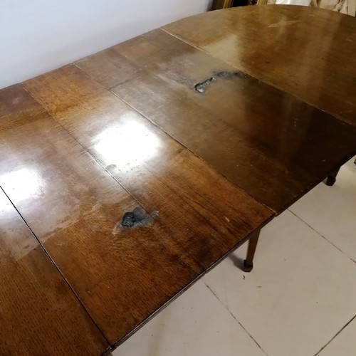 94 - Large antique oak D end dining table with central drop flap table with double swing out leg supports... 