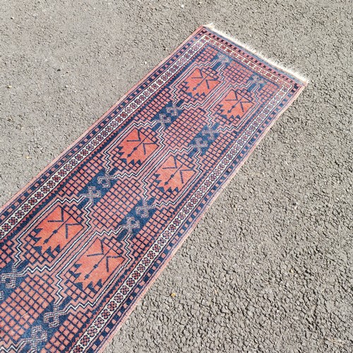 125 - Hand woven geometric ethnic rug / runner - 278cm x 56cm and is faded