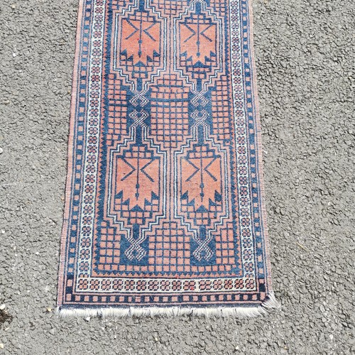 125 - Hand woven geometric ethnic rug / runner - 278cm x 56cm and is faded