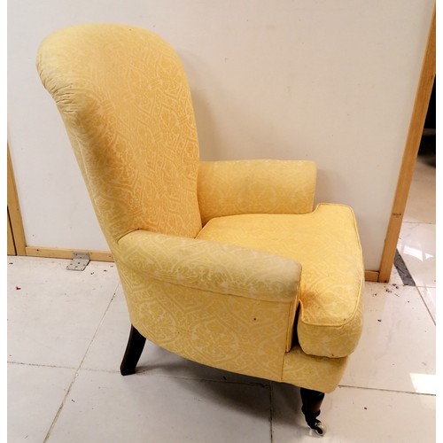 126 - Antique ladies yellow upholstered wing armchair with leather seat cushion- some marks to the fabric