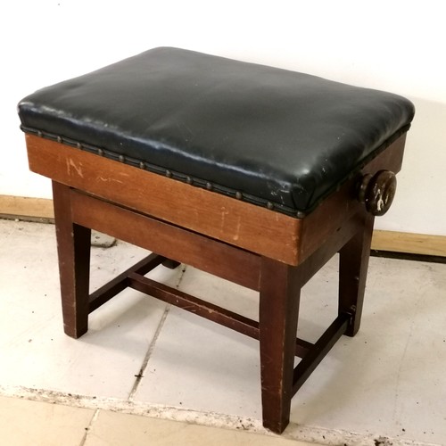 129 - Antique rectangular mahogany adjustable piano stool with black leather upholstered top - has a tear ... 