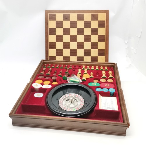 130 - Games compendium in wooden box including roulette, chess etc (not complete) and box a/f T/W a wooden... 