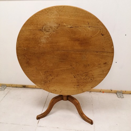 142 - Antique mahogany tilt top circular pedestal table -  88cm wide x 73cm high - has water marks