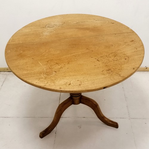 142 - Antique mahogany tilt top circular pedestal table -  88cm wide x 73cm high - has water marks