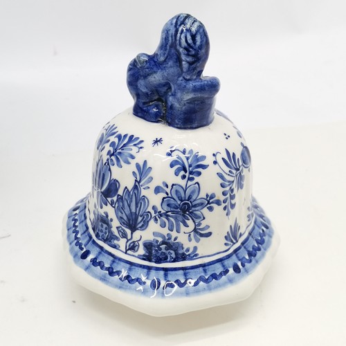 156 - Delft blue and white lidded ribbed vase with peacock decoration & marks to base with lion dog finial... 