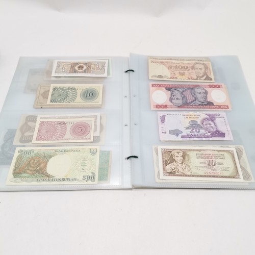 184 - Qty (in 2 albums) of world banknotes ~ approx 200