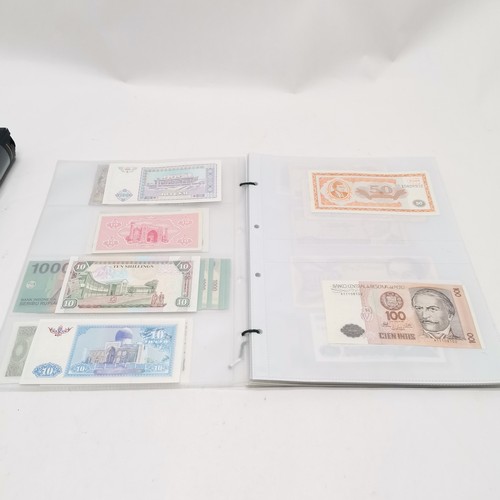 184 - Qty (in 2 albums) of world banknotes ~ approx 200