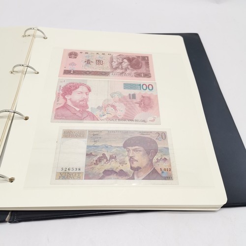 184 - Qty (in 2 albums) of world banknotes ~ approx 200