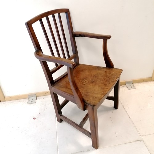 233 - Antique open arm country chair - has a split to the seat