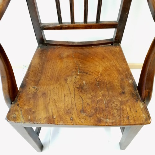 233 - Antique open arm country chair - has a split to the seat