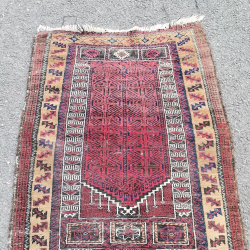 234 - Hand woven red grounded geometric prayer rug - 117cm x 84cm ~ slight losses to edge