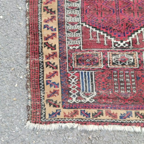 234 - Hand woven red grounded geometric prayer rug - 117cm x 84cm ~ slight losses to edge