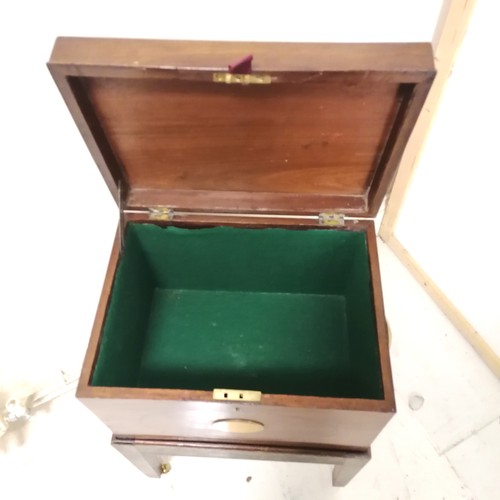 246 - Antique mahogany box with brass fittings and oval inlaid detail on stand terminating on 4 brass cast... 