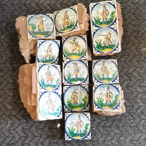 251 - 13 x antique 18th century Dutch Delft polychrome tiles depicting military figures - 13.5cm square an... 