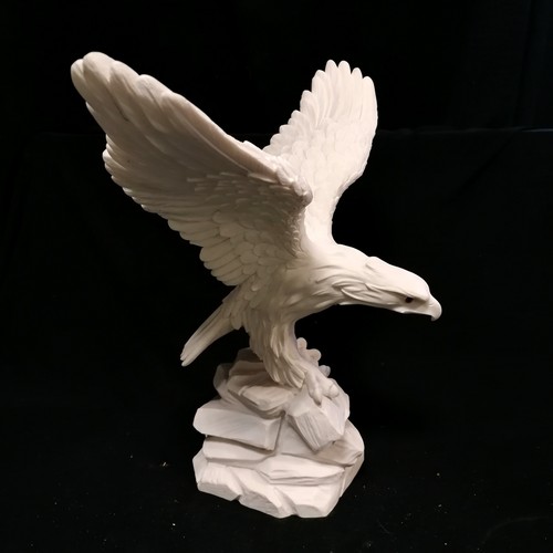 263 - White model of an eagle on a rock - 37cm high x 38cm across