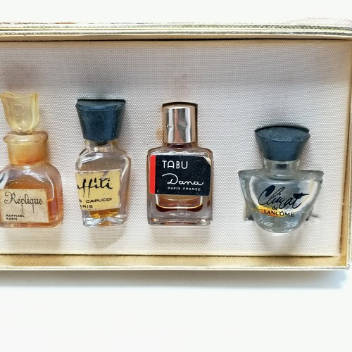 332 - Les meilleurs parfums de Paris boxed set of 10 x miniature perfume bottles - some used