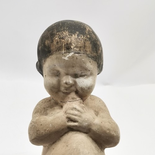 334 - Antique papier mache shop display figure of a child 35cm high - some losses and damage