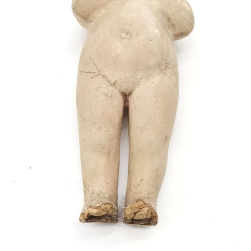 334 - Antique papier mache shop display figure of a child 35cm high - some losses and damage