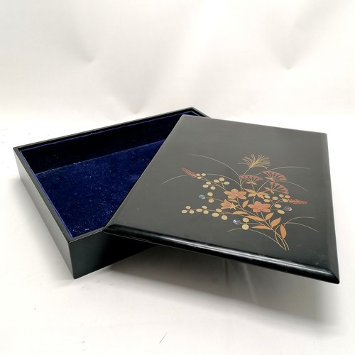 369 - Oriental black lacquer box with lift off lid and blue velevt lining and floral detail to lid - 22cm ... 