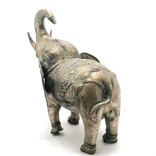 7 - Indian silvered metal model of an elephant with raised trunk - 46cm high x 36cm across ~ has casting... 