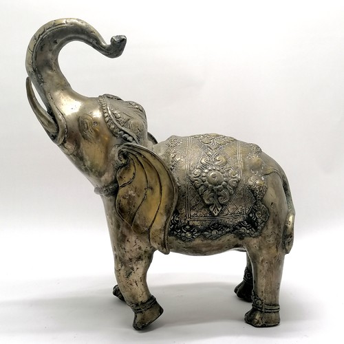 7 - Indian silvered metal model of an elephant with raised trunk - 46cm high x 36cm across ~ has casting... 