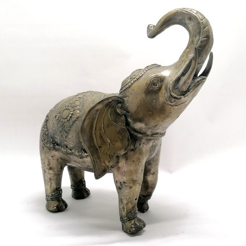 7 - Indian silvered metal model of an elephant with raised trunk - 46cm high x 36cm across ~ has casting... 