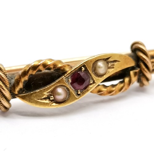 607 - Unmarked antique (touch tests as 15ct) gold brooch set with ruby & pearls - 4.5cm & 3g total weight