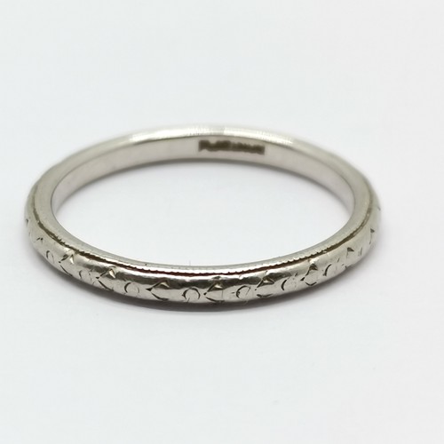 608 - Platinum marked band ring with engraved detail - size K½ & 2.8g