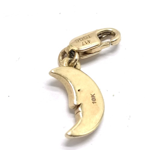 619 - Italian 10ct marked gold crescent moon set with a diamond fob pendant / charm - 2cm drop & 0.9g tota... 