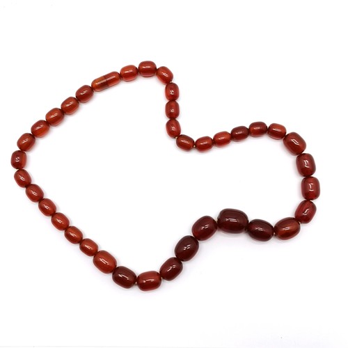 633 - Strand of graduated amber beads - 52cm & 45g ~ clasp secures but is a/f